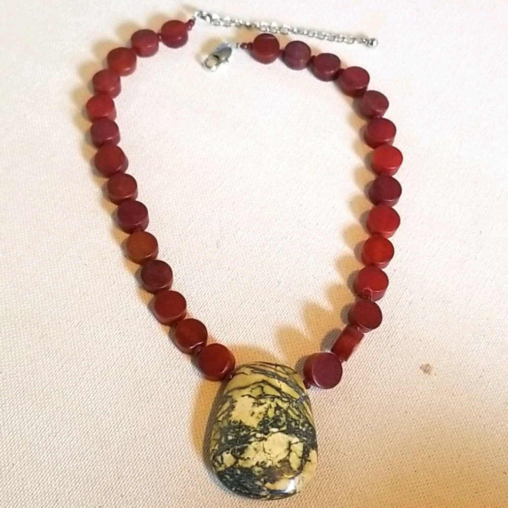 Handmade stone pendant necklace.